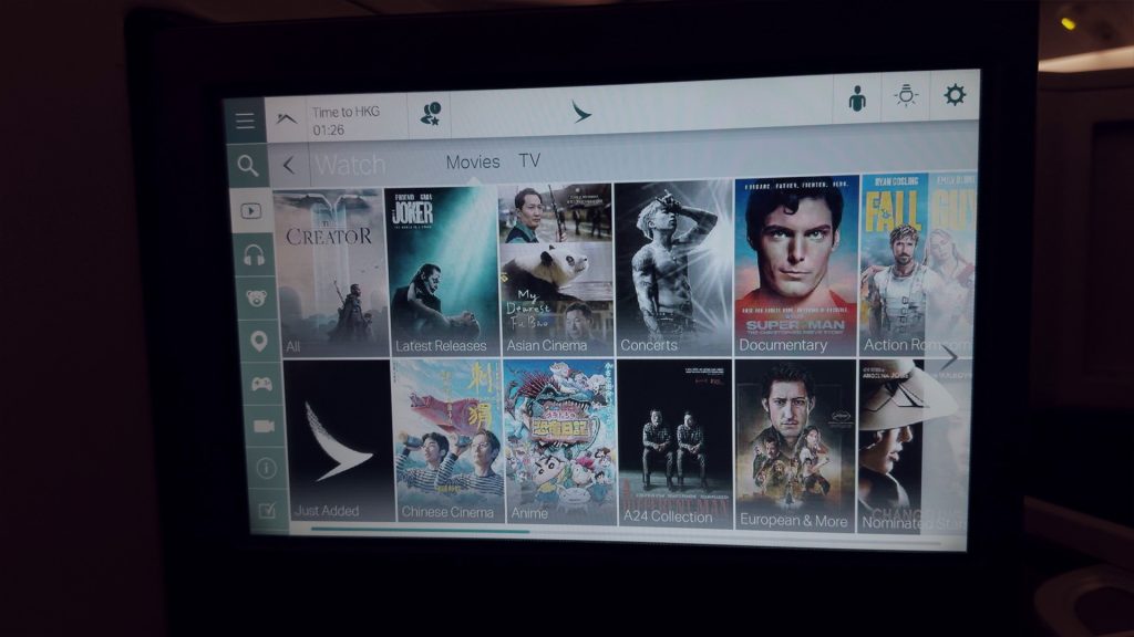 Cathay Pacific Studio IFE inflight entertainment screen displaying movie library