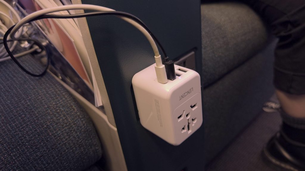 Power outlet at the Cathay Pacific 777-300 regional business class seat