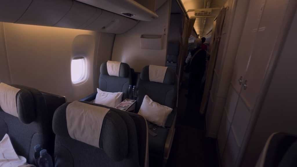 Cathay Pacific 777-300 Regional Business Class seat back window row